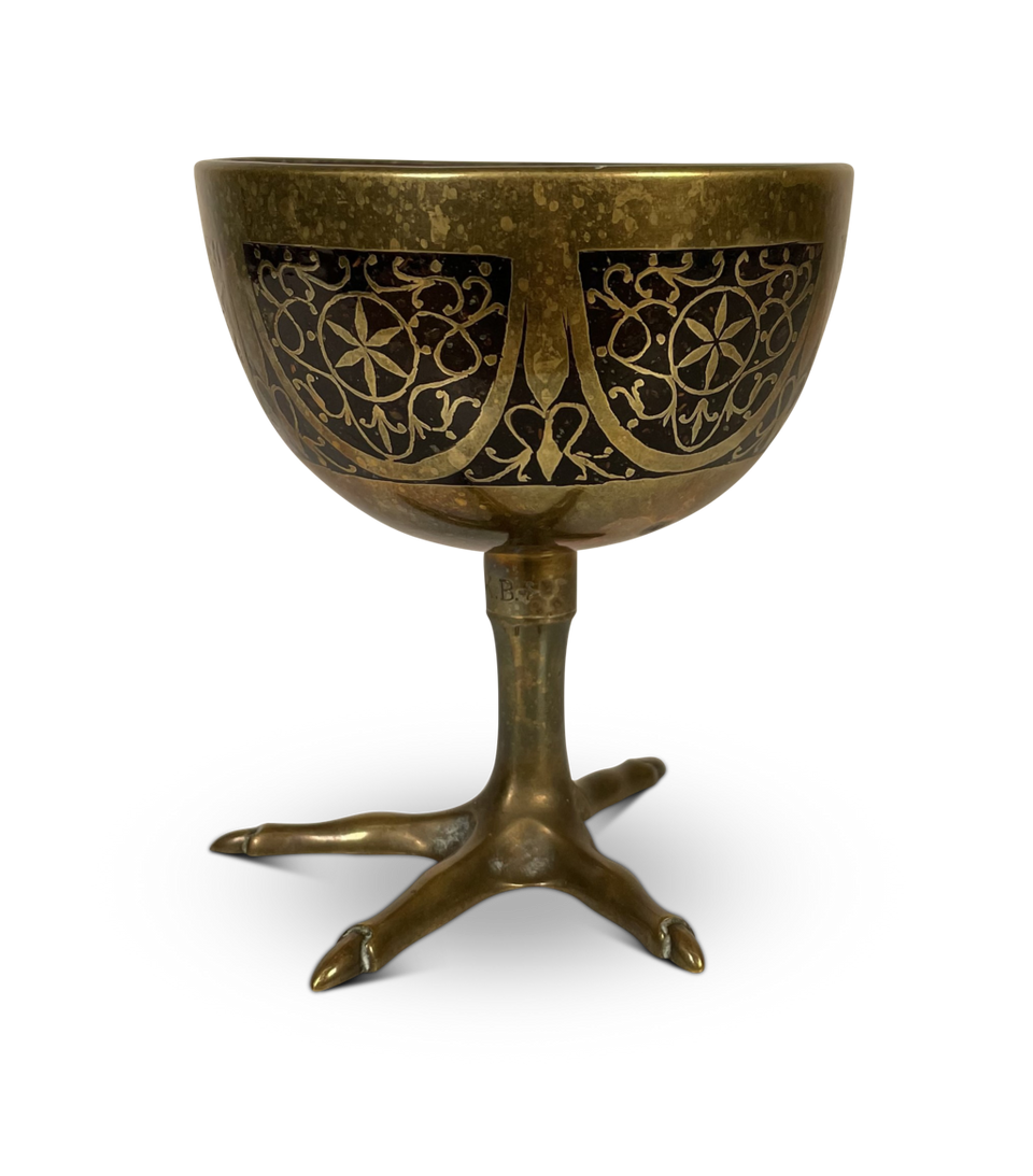 Coconut Cup in a Pierced Brass Decorated Case Elevated on a Bird Foot Base