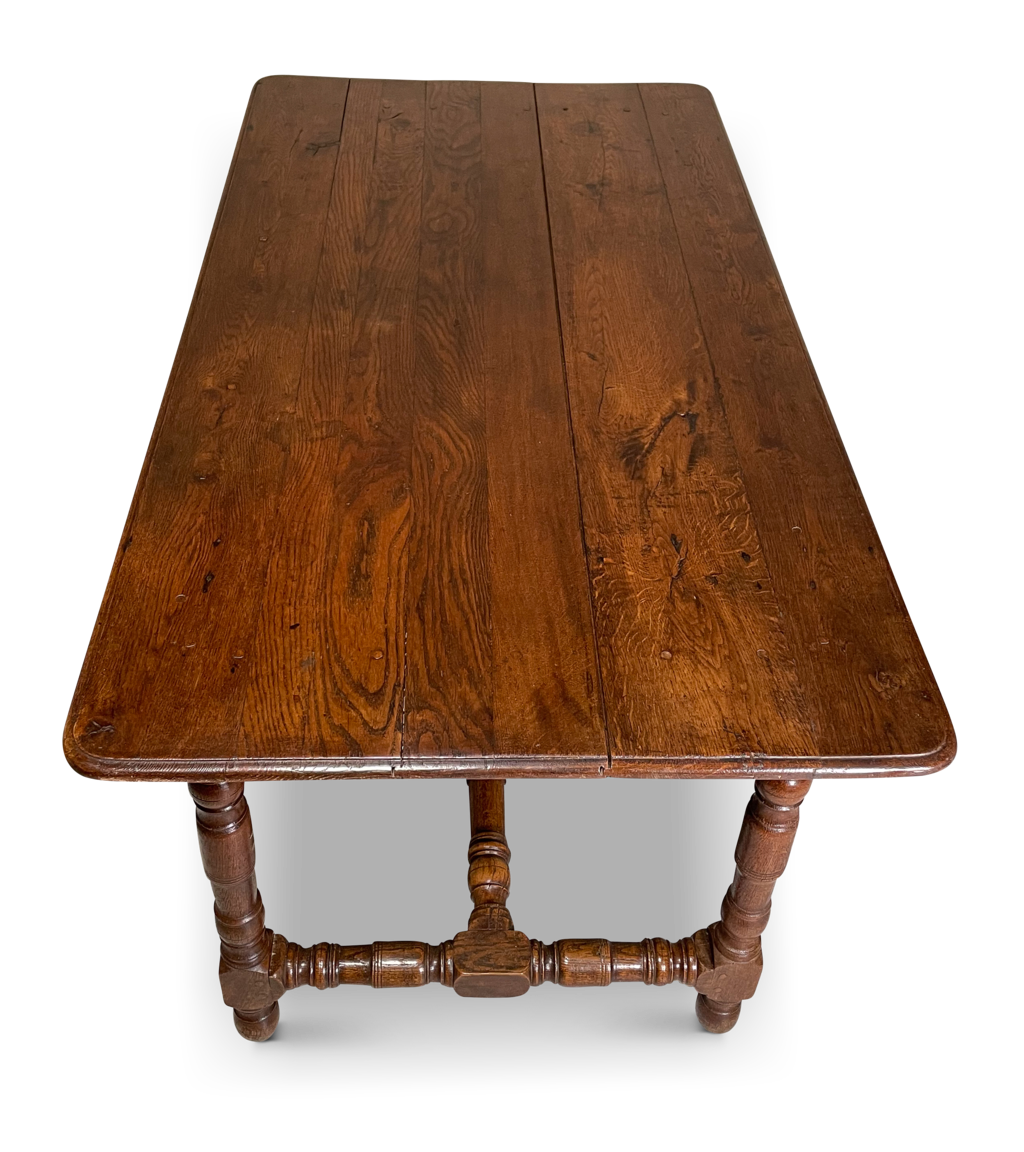 Oak Table Raised on Turned Legs