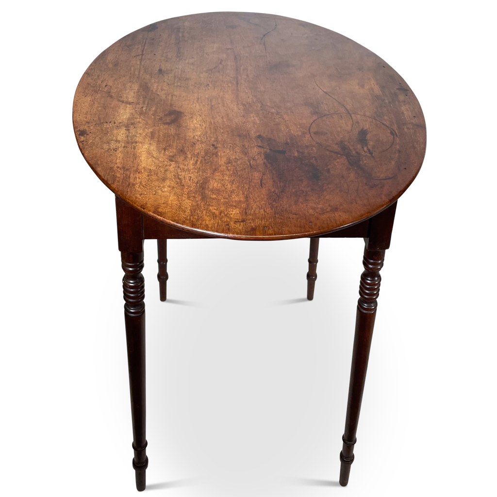 Oval Topped Occasional Table Raised on Four Slender Turned Legs