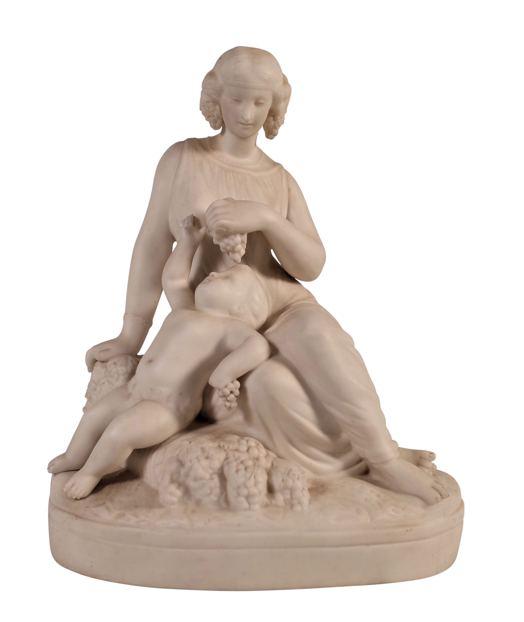 Parian Ware figure of a Seated Woman Feeding Grapes to a Child