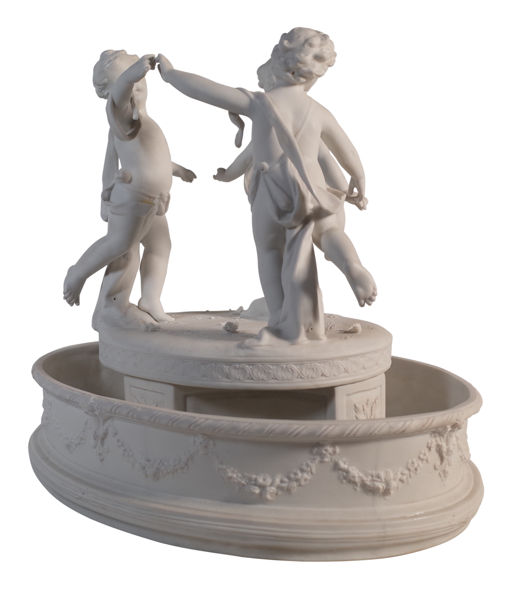 Parian Ware Circular Centrepiece of Three Putti Dancing Within a Large Bowl Decorated with Floral Swags