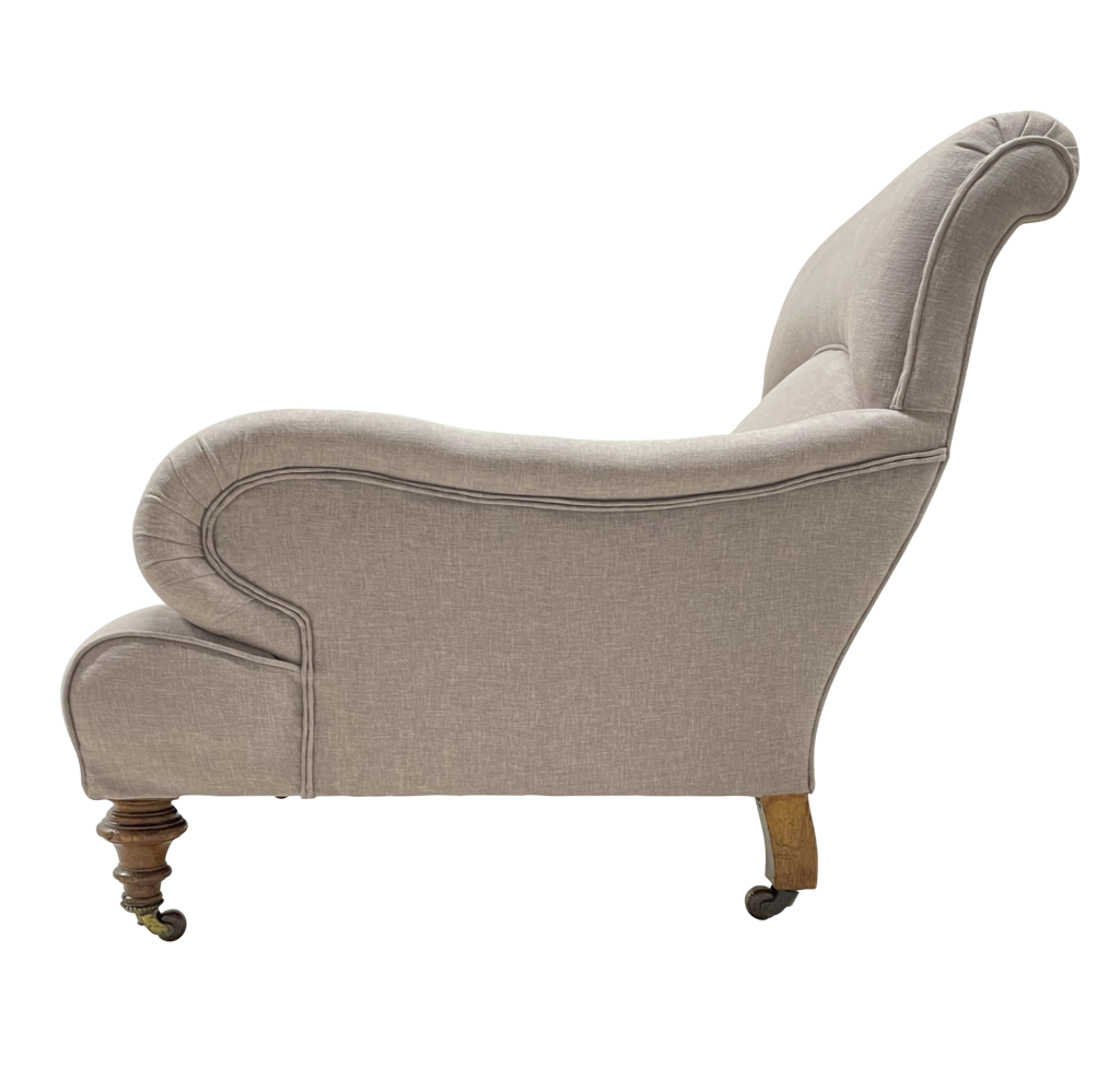 Long Armed Howard and Sons Style Armchair Raised on Turned Baluster Legs
