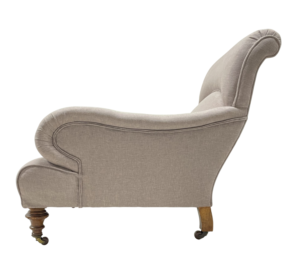 Long Armed Howard and Sons Style Armchair Raised on Turned Baluster Legs