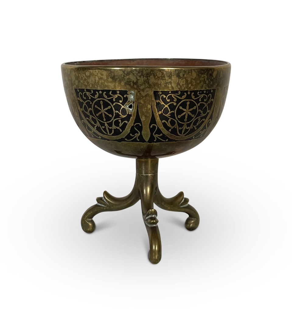 Coconut Cup in a Pierced Brass Decorated Case Elevated on a Tripod Base